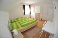 Posteľ alebo postele v izbe v ubytovaní Apartments Žugec