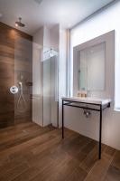 a bathroom with a sink and a shower at Hotel Marais Grands Boulevards in Paris