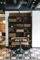 a dining room with a table and two chairs at Bobby Hotel in Nashville