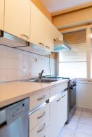 a kitchen with a sink and a stove at Apartment Duje in Split
