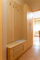 a large wooden cabinet in a room at Apartment Duje in Split