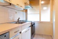 a kitchen with a sink and a stove top oven at Apartment Duje in Split