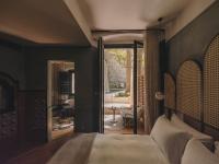 Hotel Palau Fugitにあるベッド
