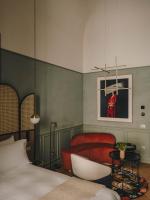 Hotel Palau Fugitにあるベッド