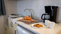 Kuchyňa alebo kuchynka v ubytovaní Filanthi Apartments