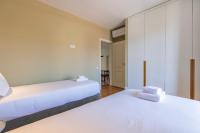Postel nebo postele na pokoji v ubytování Liberdade Concept 3BDR Apartment by LovelyStay