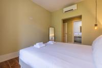 Postel nebo postele na pokoji v ubytování Liberdade Concept 3BDR Apartment by LovelyStay