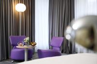 Ein Sitzbereich in der Unterkunft Park Plaza Berlin