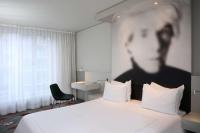 Ein Bett oder Betten in einem Zimmer der Unterkunft Park Plaza Berlin