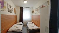Postel nebo postele na pokoji v ubytování Apartments Gato Karlovy Vary Stara Role