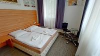 Postel nebo postele na pokoji v ubytování Apartments Gato Karlovy Vary Stara Role