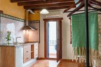 Kuchyňa alebo kuchynka v ubytovaní SUITES CASA DE LAS COLUMNAS