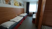 Postel nebo postele na pokoji v ubytování Apartments Gato Karlovy Vary Stara Role