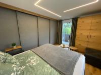 A bed or beds in a room at Alpenglück - Hinterthal