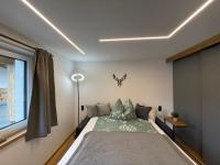 A bed or beds in a room at Alpenglück - Hinterthal