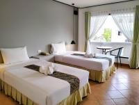 Blue Carina Hotel Phuketにあるベッド