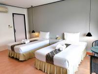 Blue Carina Hotel Phuketにあるベッド