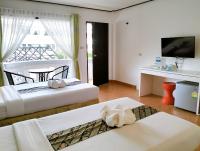 Blue Carina Hotel Phuketにあるベッド