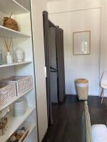a room with a closet with a refrigerator at Spacieux T3 haussmannien in Toulon