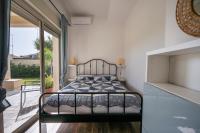 Łóżko lub łóżka w pokoju w obiekcie Villa Nisa apartment