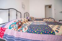 Łóżko lub łóżka w pokoju w obiekcie Villa Nisa apartment