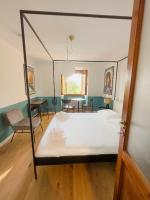 A bed or beds in a room at La Donota