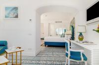 TV a/nebo společenská místnost v ubytování Il San Pietro di Positano