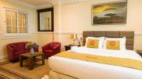Ένα ή περισσότερα κρεβάτια σε δωμάτιο στο Zimansky Hotel