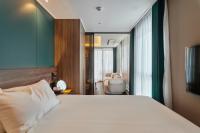 Sienna Ambassador Residenceにあるベッド