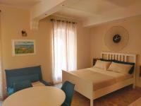 A bed or beds in a room at MancioBiba Home