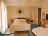 A bed or beds in a room at MancioBiba Home