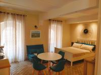 A bed or beds in a room at MancioBiba Home