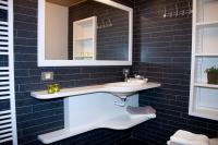 a bathroom with a sink and a mirror at B&amp;B - Ter Douve in Dranouter