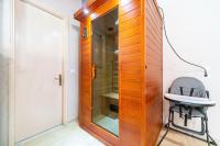 a bathroom with a toilet and a sink and a mirror at Giourgas house in Chlomatianá