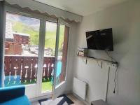 Televízia a/alebo spoločenská miestnosť v ubytovaní CHALET CLUB VAL CLARET 1 46