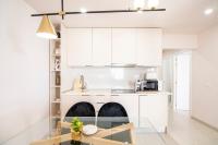 Kuchyň nebo kuchyňský kout v ubytování Palangre Luxury Apartment
