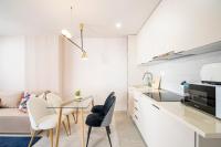Kuchyň nebo kuchyňský kout v ubytování Palangre Luxury Apartment