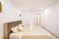 Postel nebo postele na pokoji v ubytování Palangre Luxury Apartment