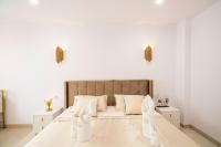 Postel nebo postele na pokoji v ubytování Palangre Luxury Apartment