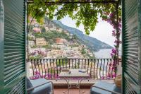 a balcony with a view of the amalfi coast at Hotel Poseidon in Positano