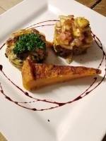 een wit bord met een stukje eten erop bij Karoo Gariep Tented Camp in Hanover Road