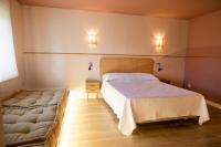 Łóżko lub łóżka w pokoju w obiekcie Hospedaje Villa Pilar