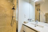 a bathroom with a sink and a shower at Bella Cruz - Charmant appt à Dinard in Dinard