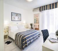 Posteľ alebo postele v izbe v ubytovaní Hotel San Michele