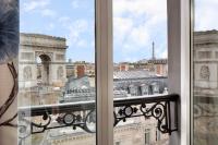 a view of the louvre from a window at Splendid Etoile in Paris