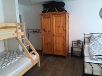 A bed or beds in a room at Haus Reimon Apt Reinhard