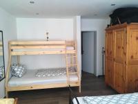 A bed or beds in a room at Haus Reimon Apt Reinhard