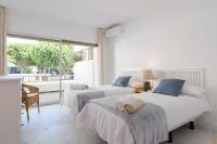 Postel nebo postele na pokoji v ubytování Jardines del Mar Apartments