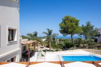 a view of the pool from the balcony of a villa at Angels Villa in Kambánion