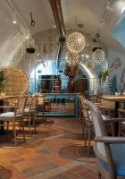 Reštaurácia alebo iné gastronomické zariadenie v ubytovaní Apartamenty Sowa Toruń